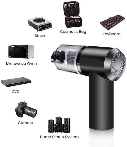 Compact wireless handheld vacuum cleaner with black and transparent parts next to electronic devices and household items